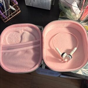 Pink Aftershokz blue tooth headphones and case